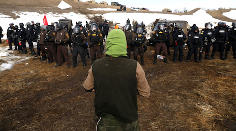 Police & military clear DAPL protest camp, dozens arrested, protesters ...